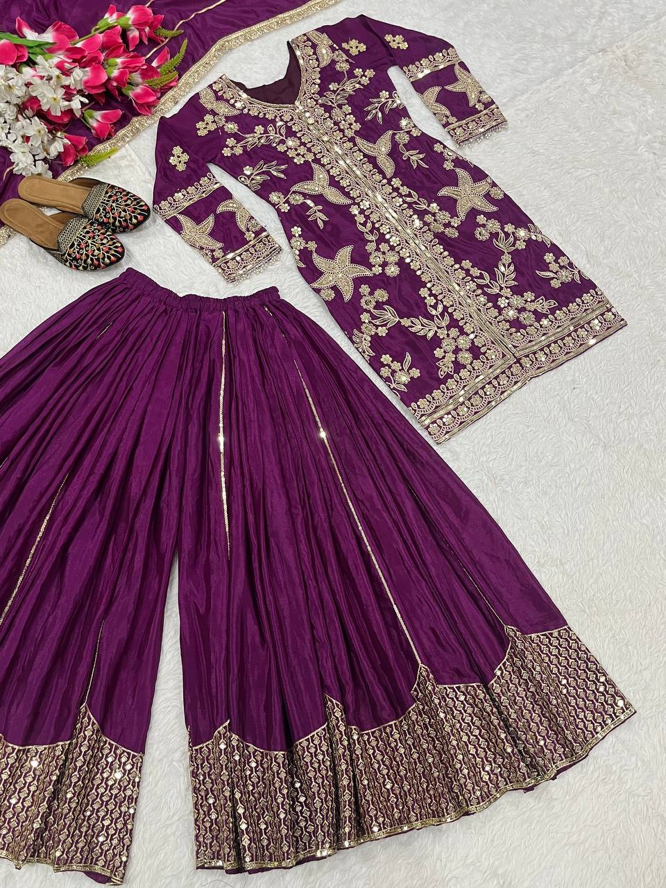 Regal Wine Purple Kurti and Flared Palazzo Suit Set Embellished with Intricate Floral Zari and Mirror Work